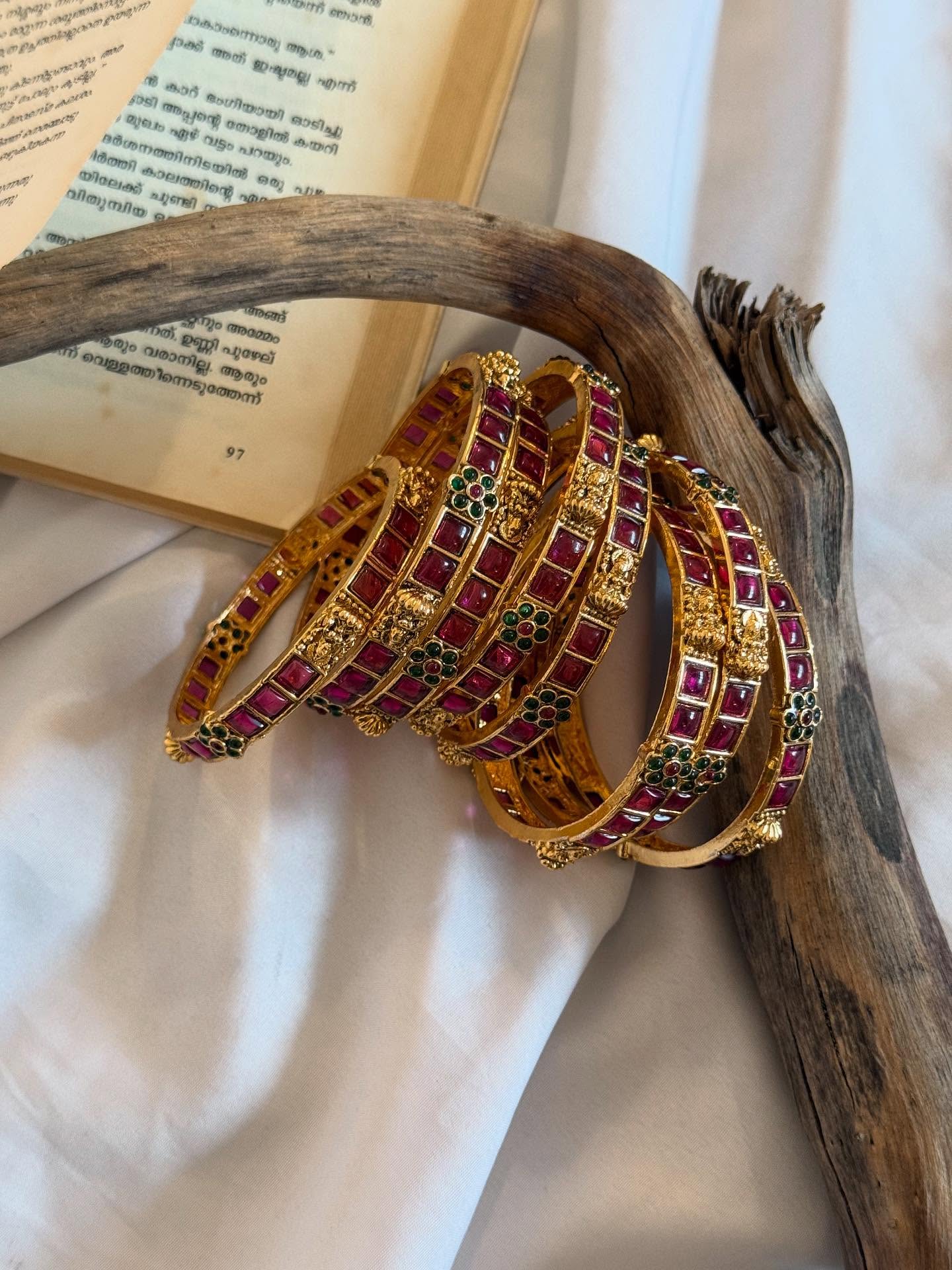 Square Ruby Stones With Green Flowers And Lakshmi Motif Gold Bangles