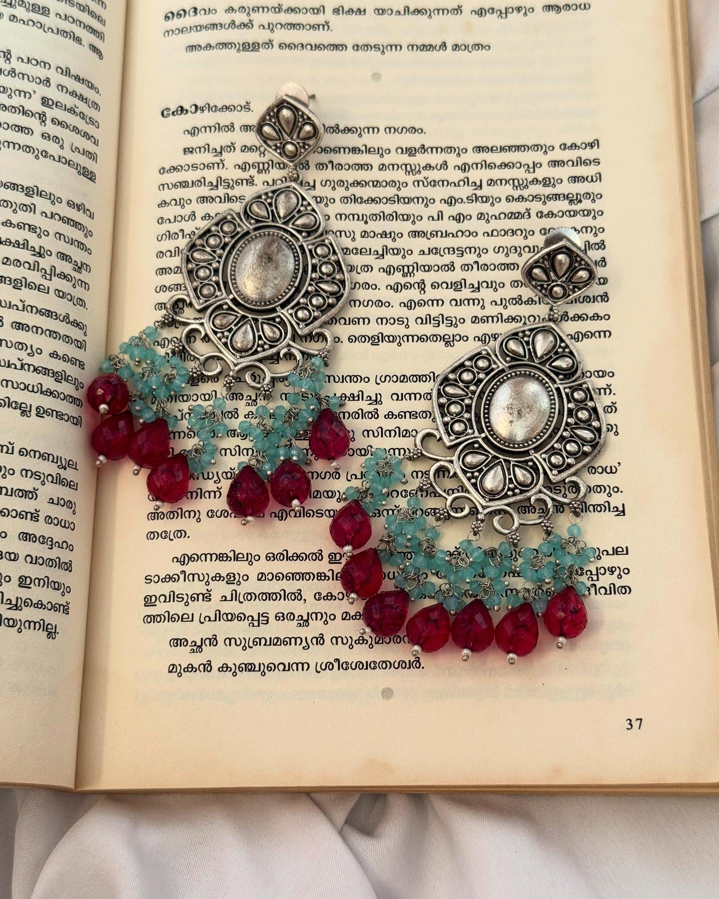 Silver LookalikeIntricate Design With Pink And Blue Beads Hangings Danglers