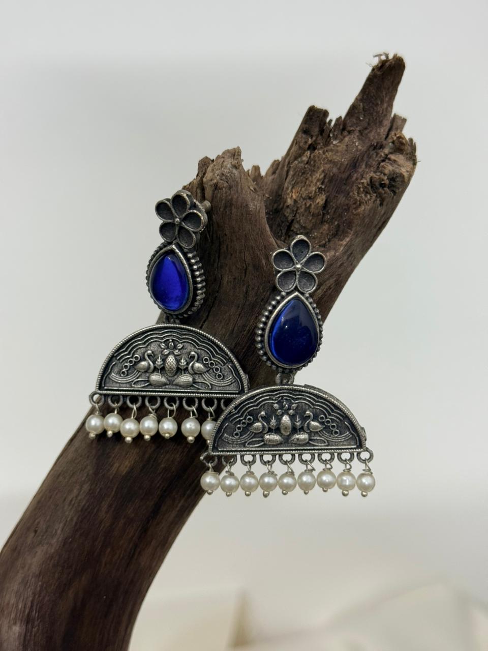 Silver Lookalike Blue Enamelled Peacock And Flower Motif Danglers