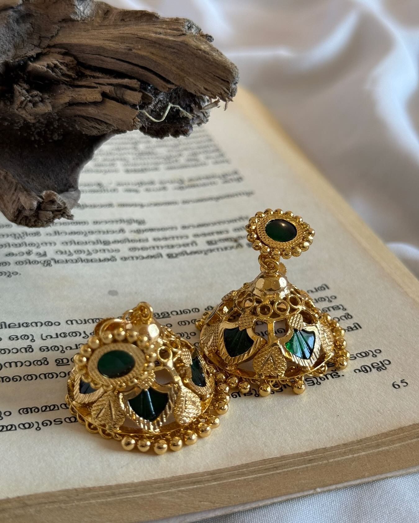 Palakka Jhumka Gold Polished Earrings