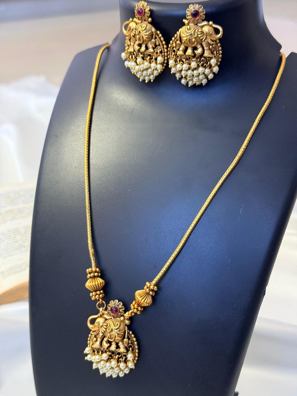 Elephant Pendant With White Gungroos Haaram With Earrings