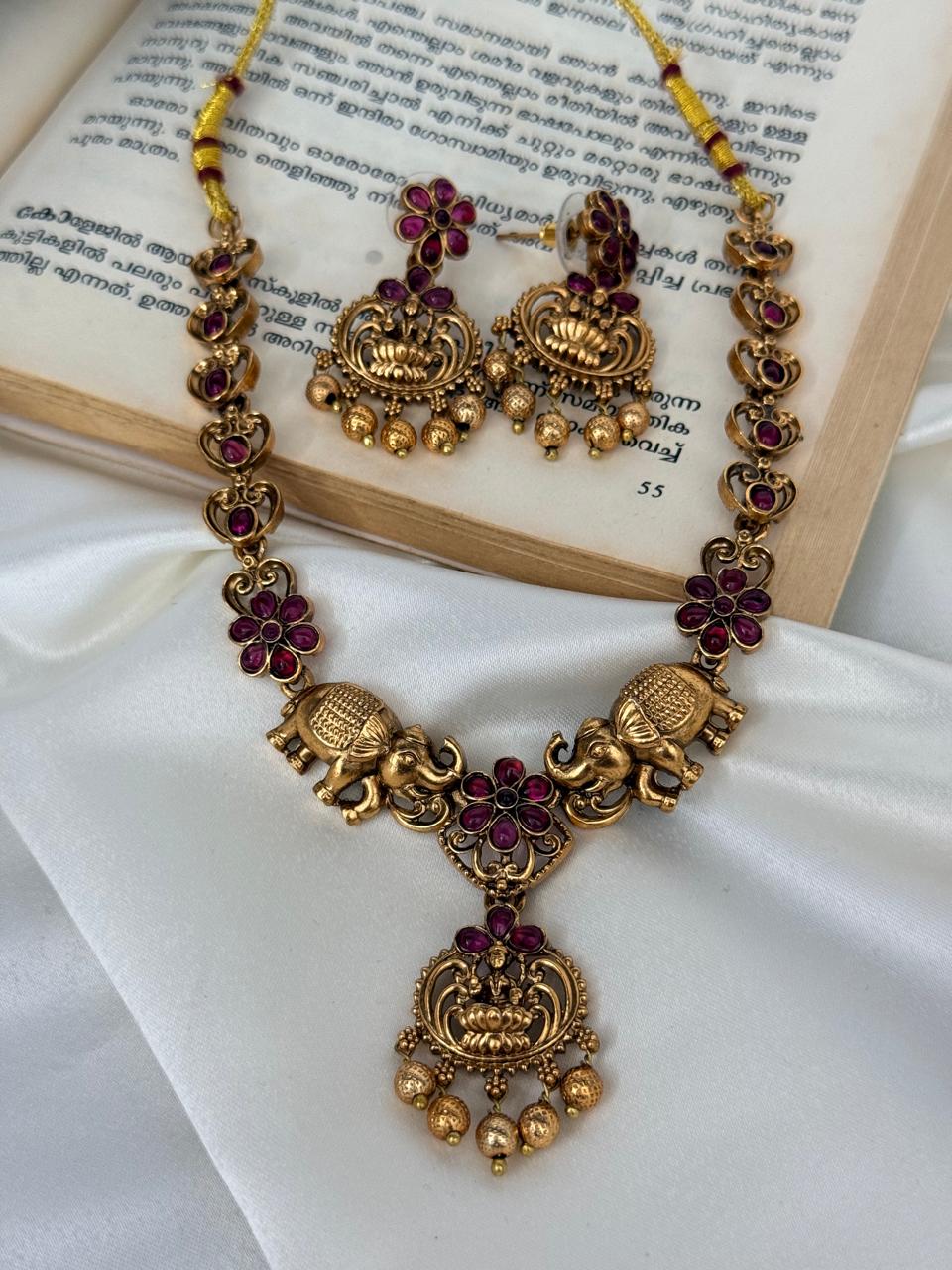 Ruby Flower Lakshmi And Elephant Motifs Necklace With Earrings