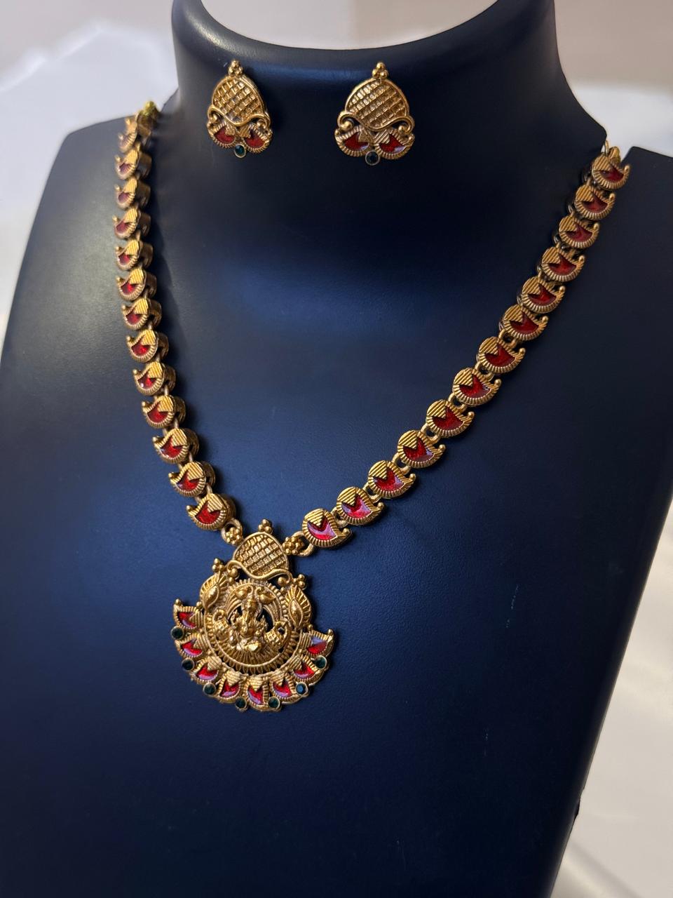 Red Enamelled Mango Design With Lakshmi Pendant Necklace With Earrings