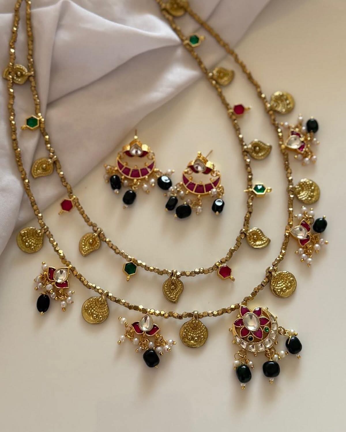 Double Layer Multiple Jadau Kundan With Brass Charms And Facet Beads Handmade Necklace With Earrings