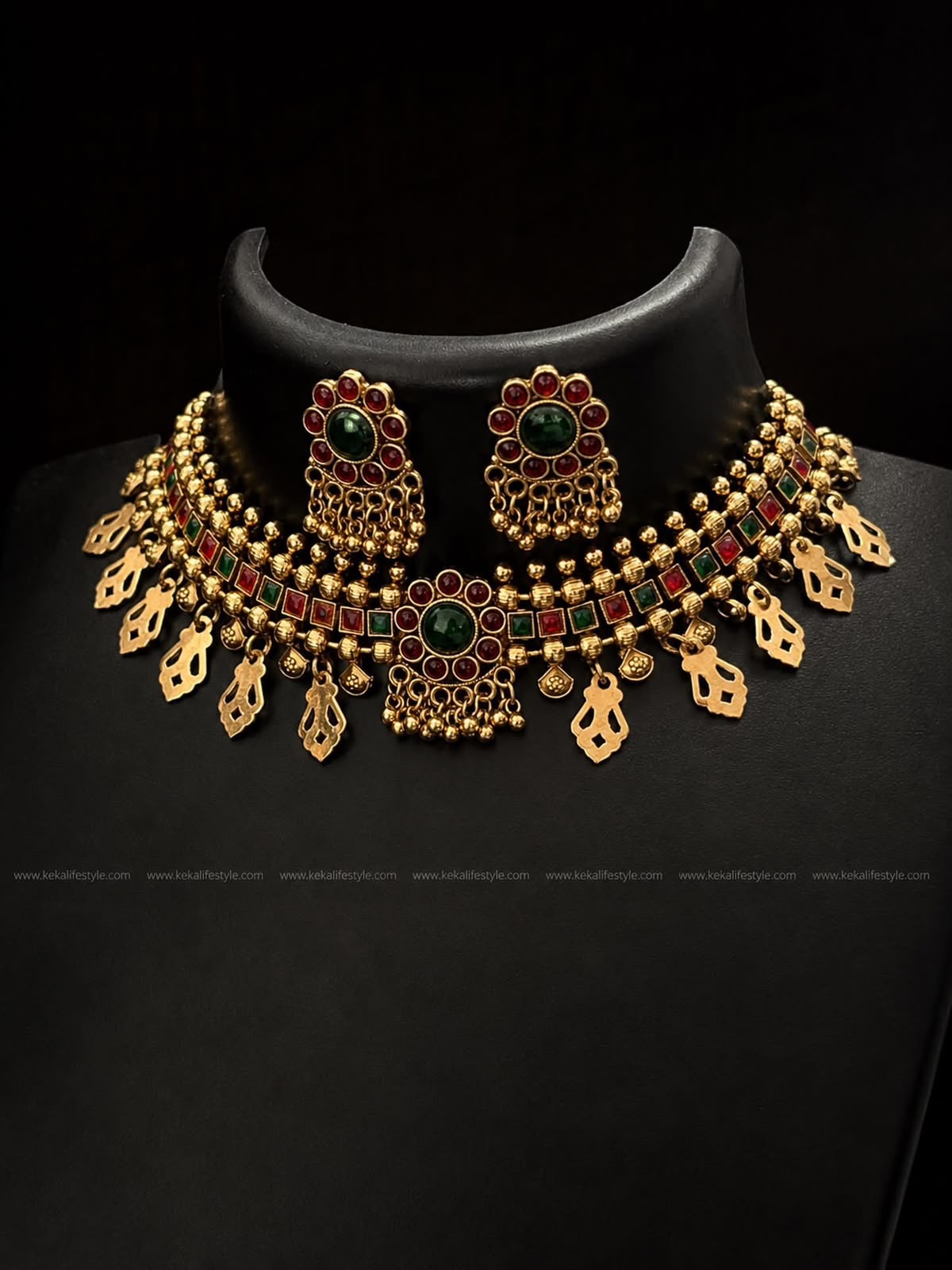 NGN0253 - Premium antique choker with ruby, emerald green stone embellishments and leaf danglings. Complete set with matching earrings.