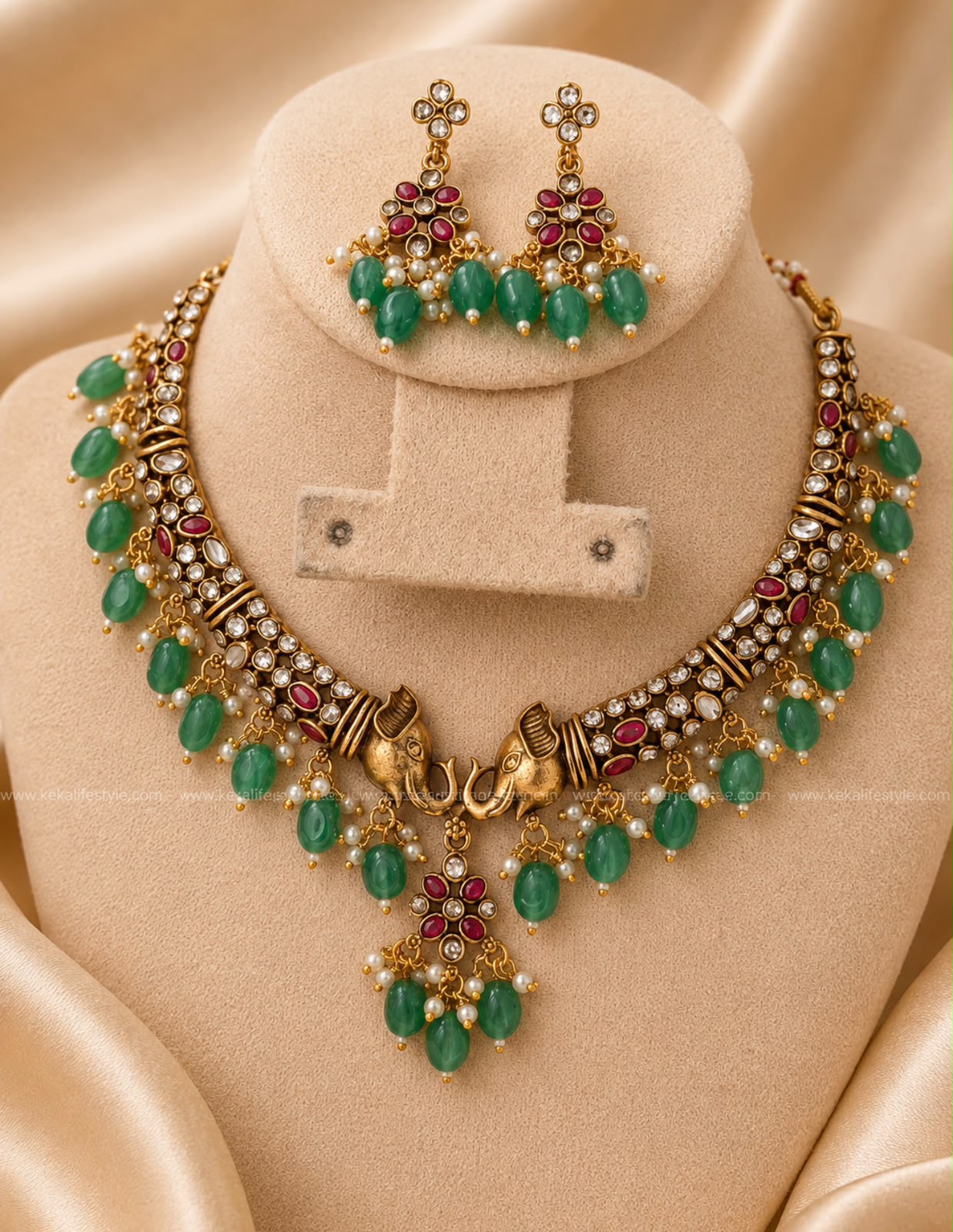 NGN0297 - Elephant necklace with beautiful mint jade drops.