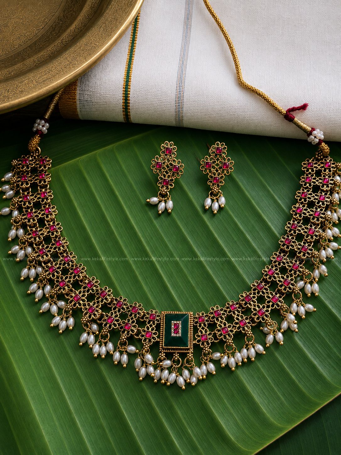 Rice pearl hangings ruby necklace. With earrings