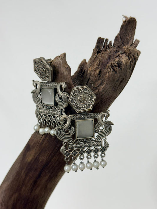 Silver Lookalike Ash Color Enamelled Peacock Motif Danglers