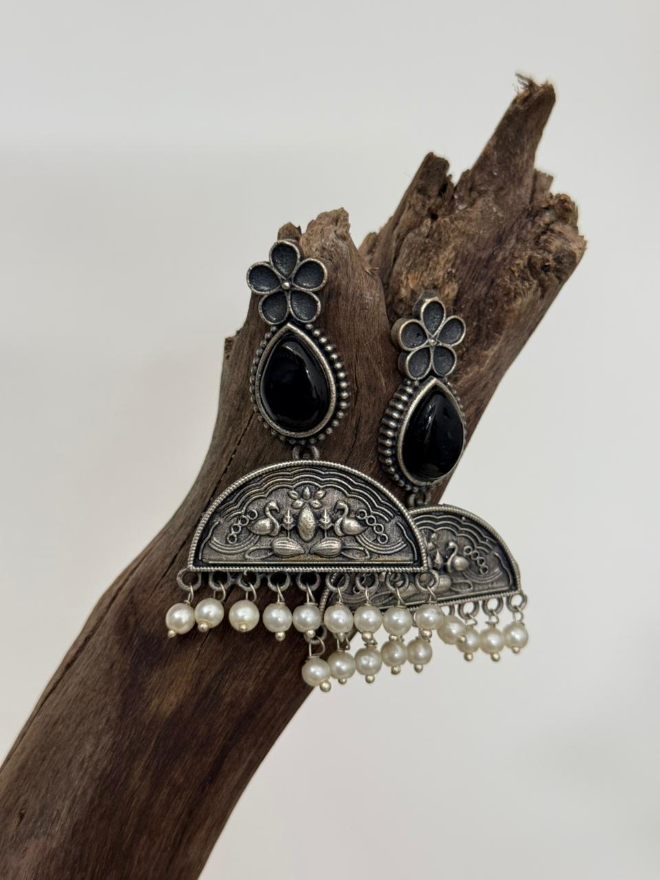 Silver Lookalike Black Enamelled Peacock And Flower Motif Danglers