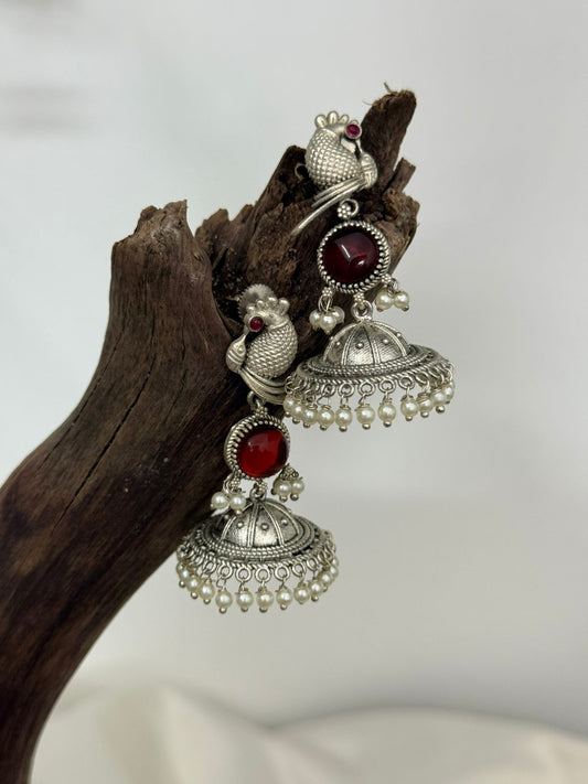 Silver Lookalike Peacock And Red Stone Jhumka