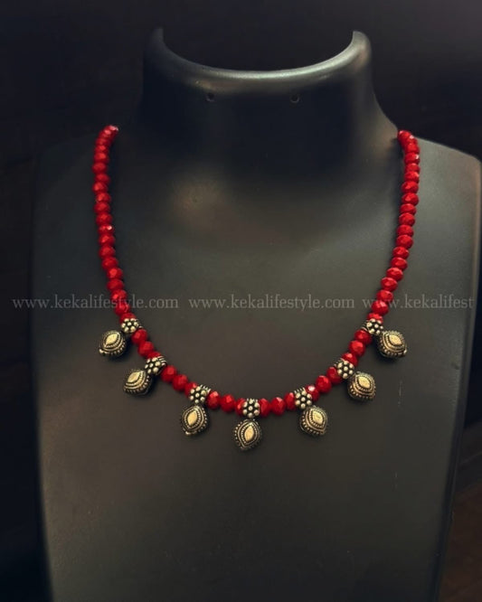 Glass beads with kohlapuri charms