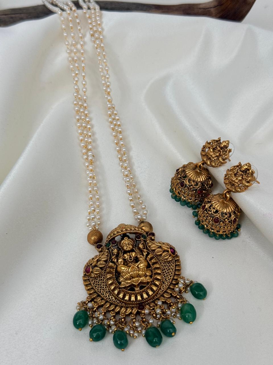 Lakshmi Pendant In Layered Pearl Chain Haaram With Earrings