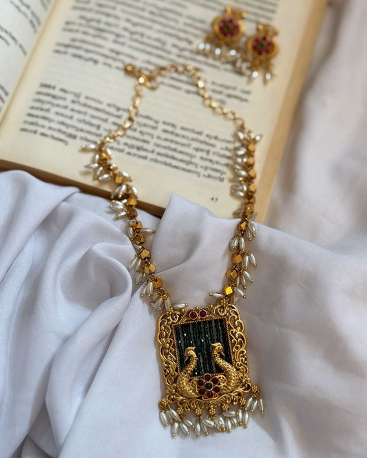 Non Idol Pendant In Rice Pearl Chain Haaram With Earrings