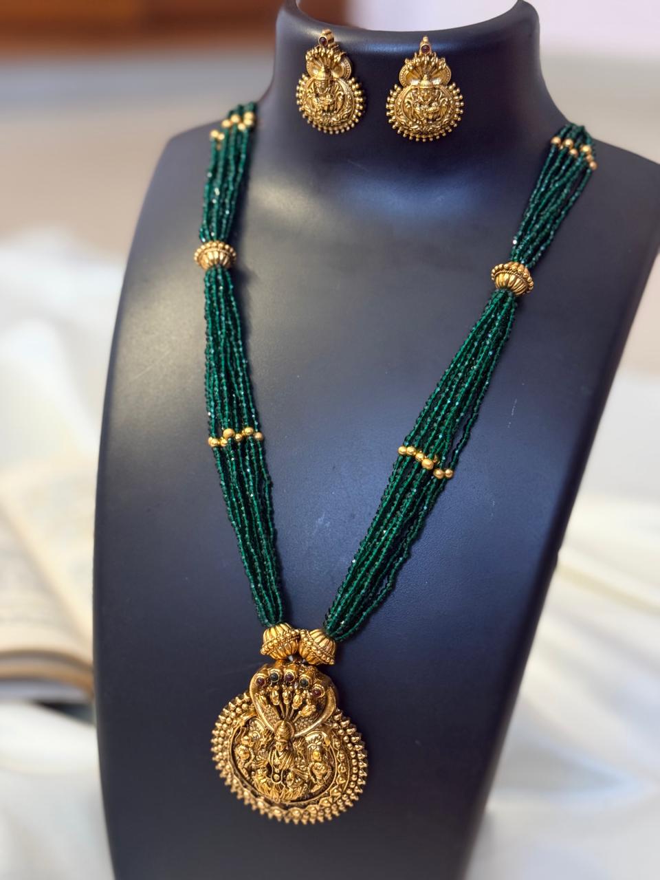 Lakshmi Pendant In Bottle Green Sugar Beads Chain Haaram With Earrings