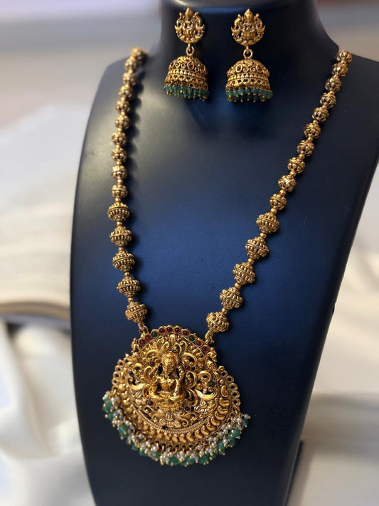 Lakshmi Pendant In Golden Balls Chain Haaram With Earrings