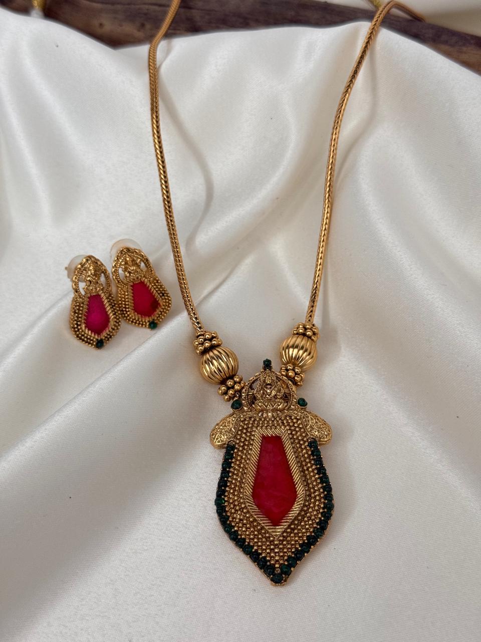 Pink Lakshmi Pendant In Chain Necklace With Earrings