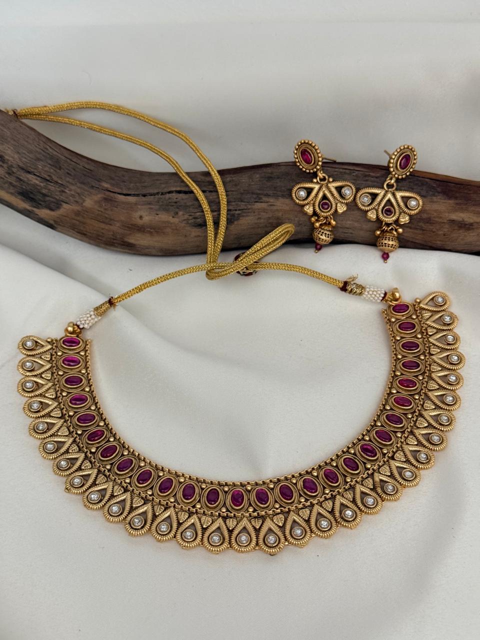 Matte Finished Ruby Stone With Flower Motif Necklace With Earrings