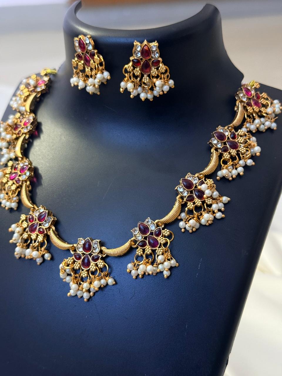 Ruby And White Stone Lotus And Gungroos Necklace With Earrings