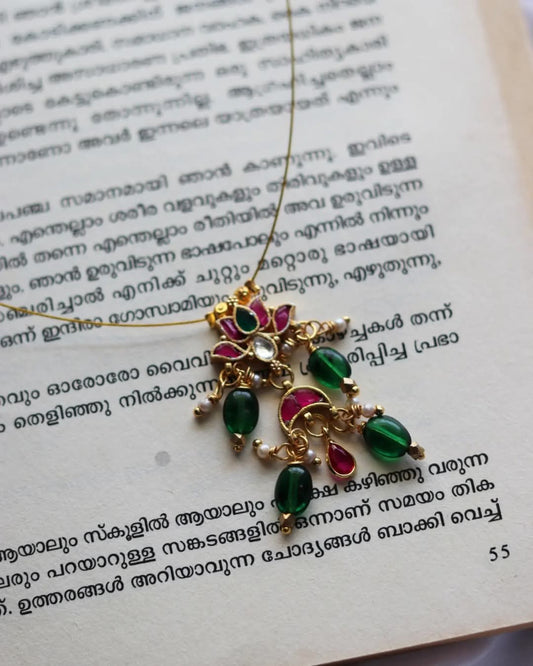 Jadau Kundan Lotus With Inverted Moon And Pink Polki Drops Along With Green Beads Handmade Necklace