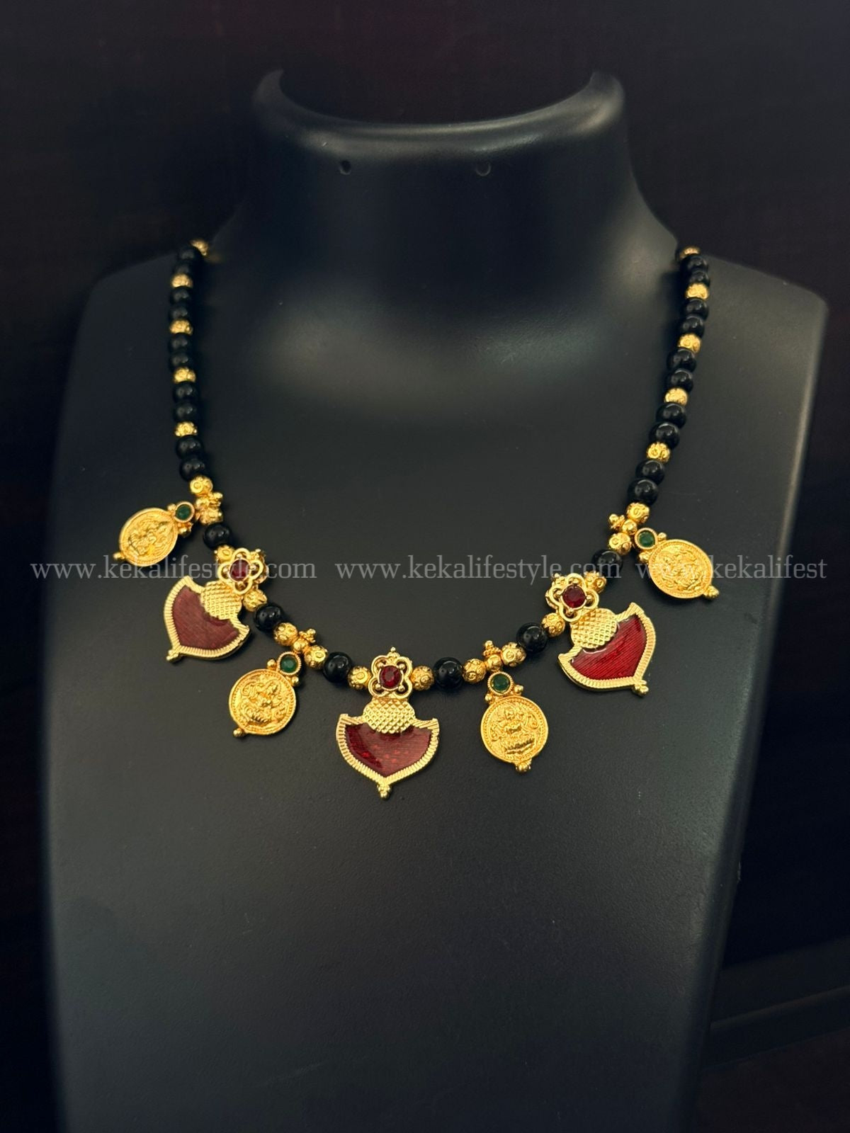 Palakka and coin necklace
