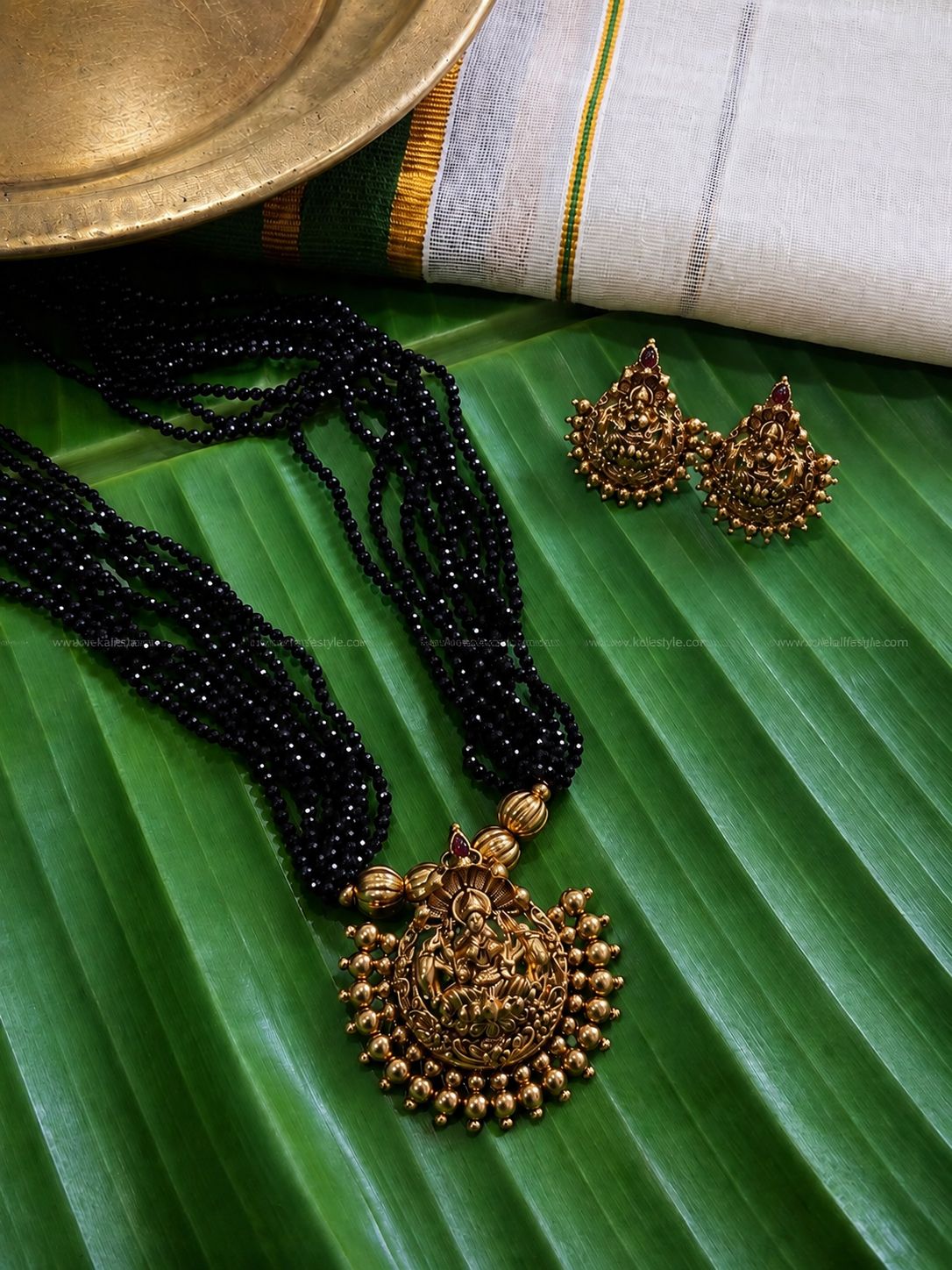 Lakshmi pendant in black sugar beads layer chain with earrings