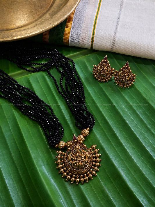 Lakshmi pendant in black sugar beads layer chain with earrings