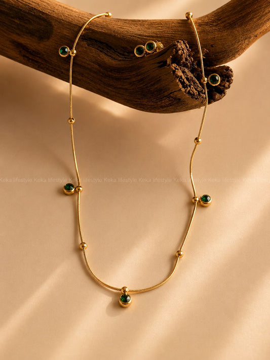 Anti tarnish premium quality daily wear emerald glow chain with earrings. Product code: NA0018