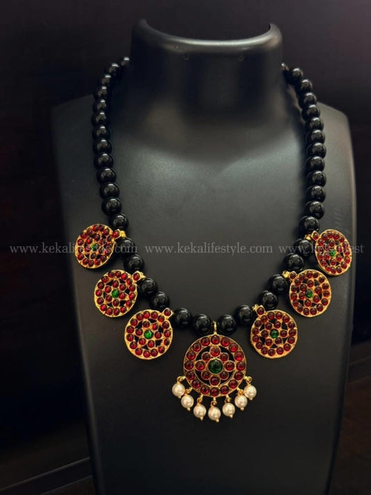 Combination of black beads and kemp charms