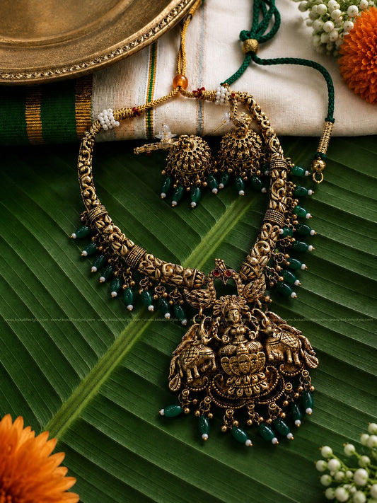 Hasli lakshmi pendant necklace with earrings