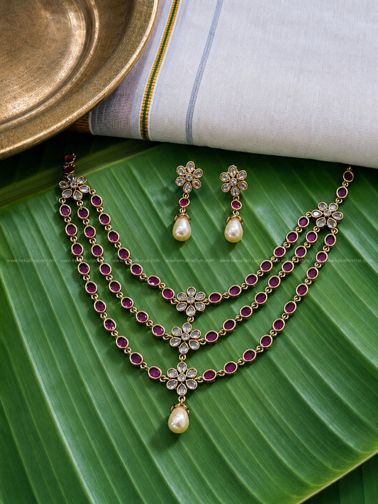 Triple layer ruby stone,flower motif necklace with earrings