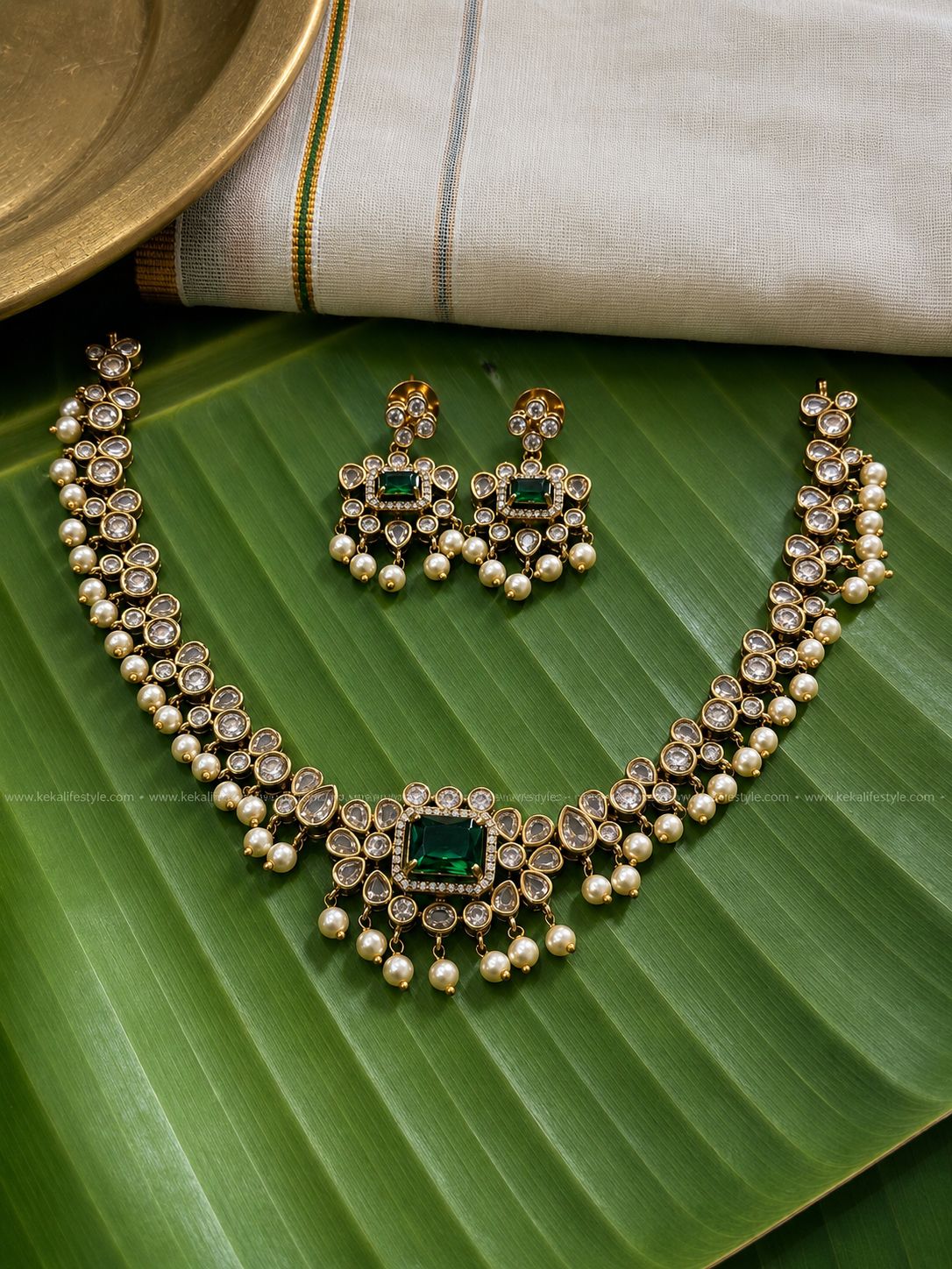 AD stone -pearl drops necklace with earrings.