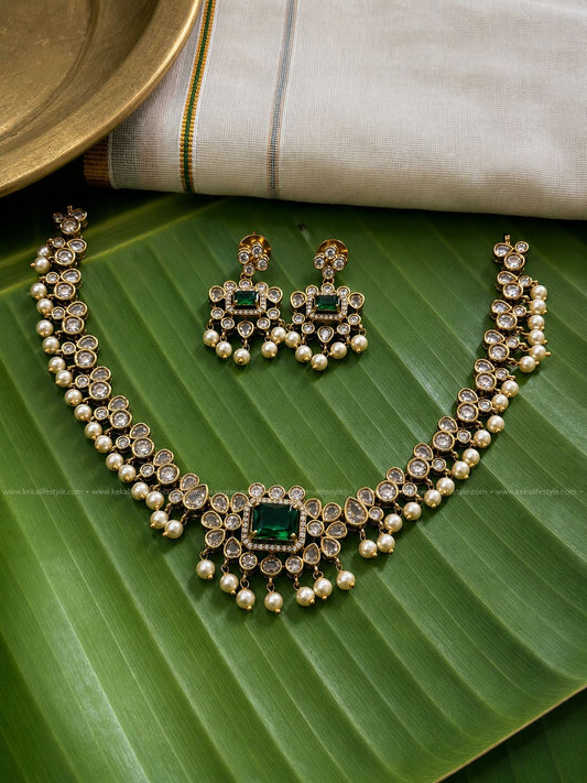 AD stone -pearl drops necklace with earrings.