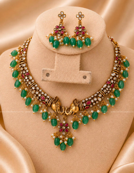 NGN0297 - Elephant necklace with beautiful mint jade drops.