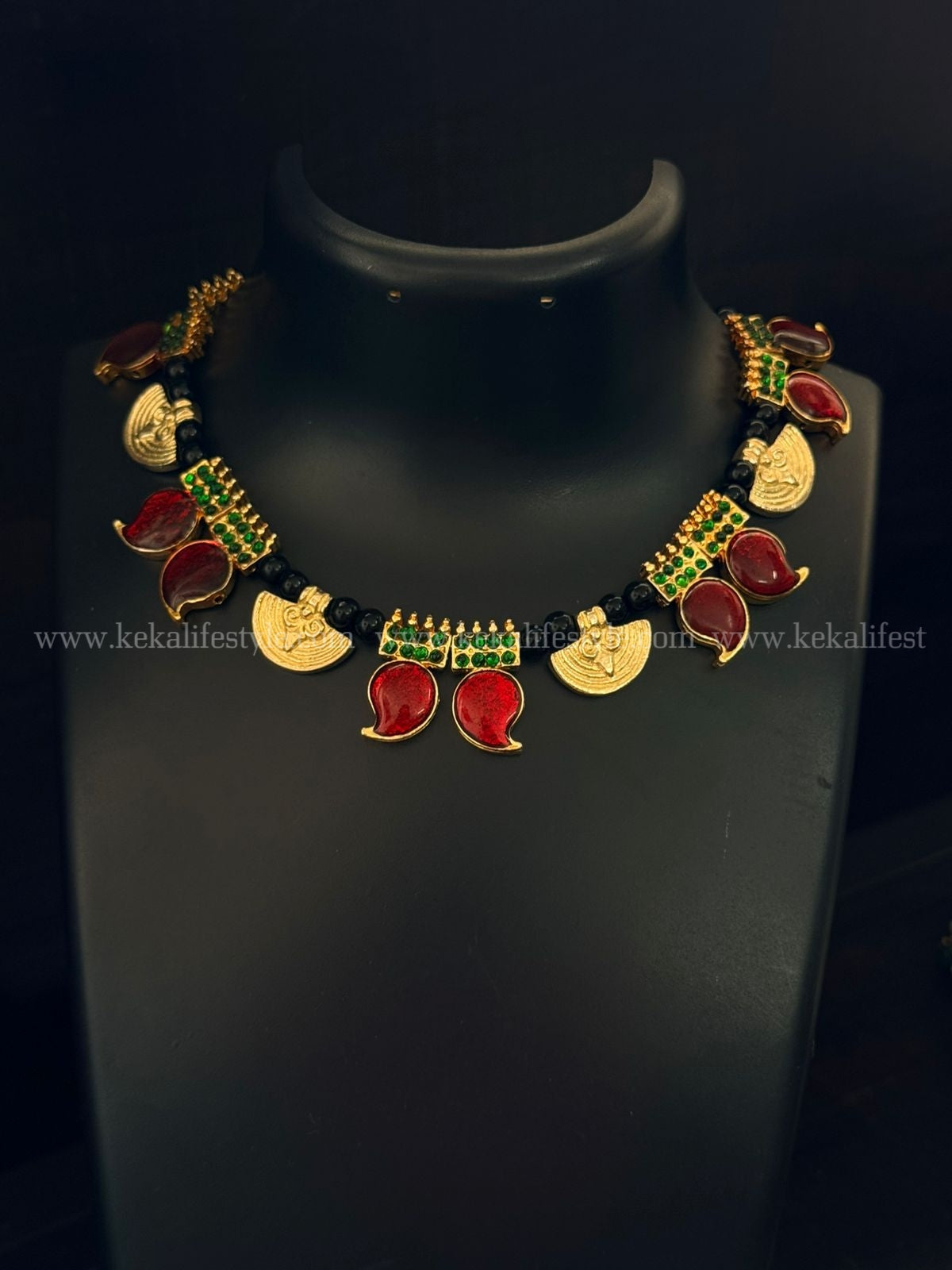 Mango pendants with brass charms
