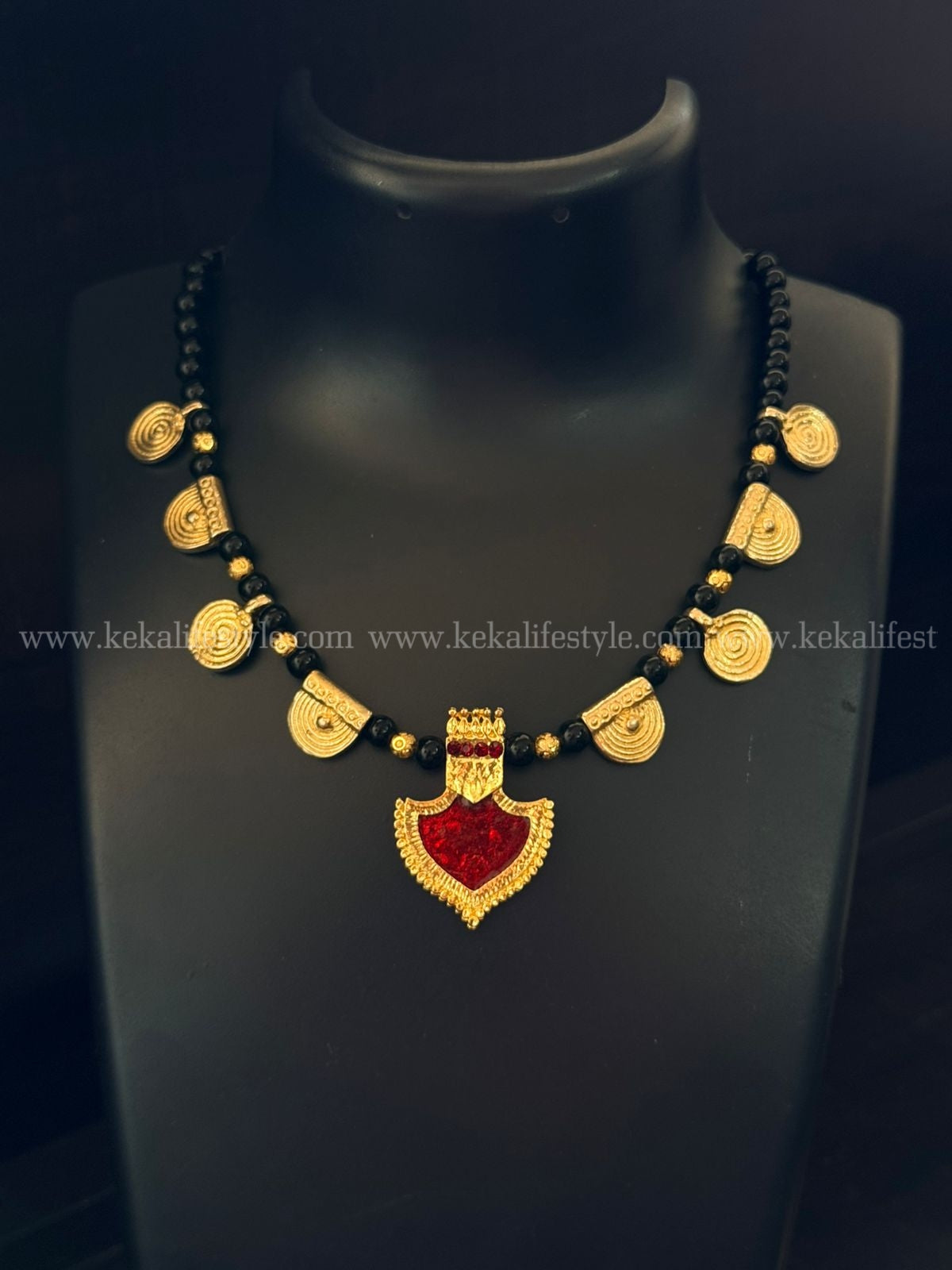 Palakka and coin necklace