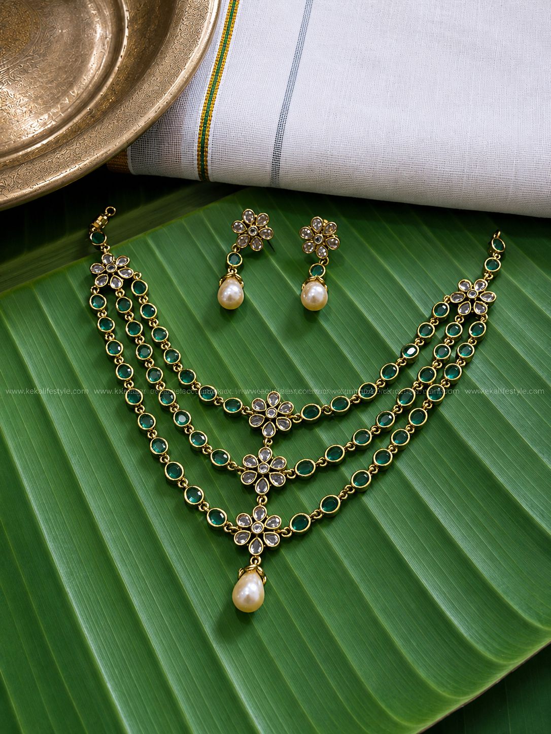 Triple layer green stone,flower motif necklace with earrings